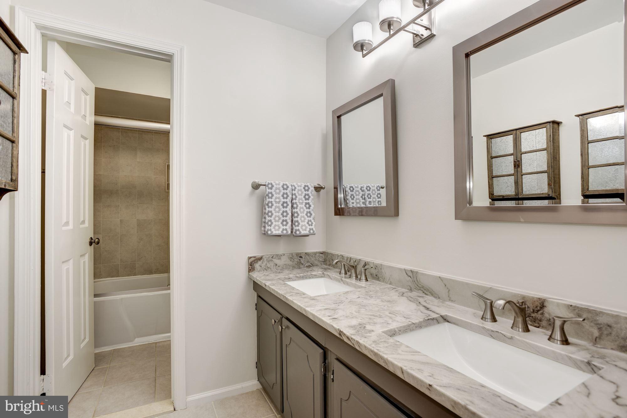 923 Ridge Drive McLean, VA 22101 - Photo 40 of 78 Upper level bathroom with dual vanities
