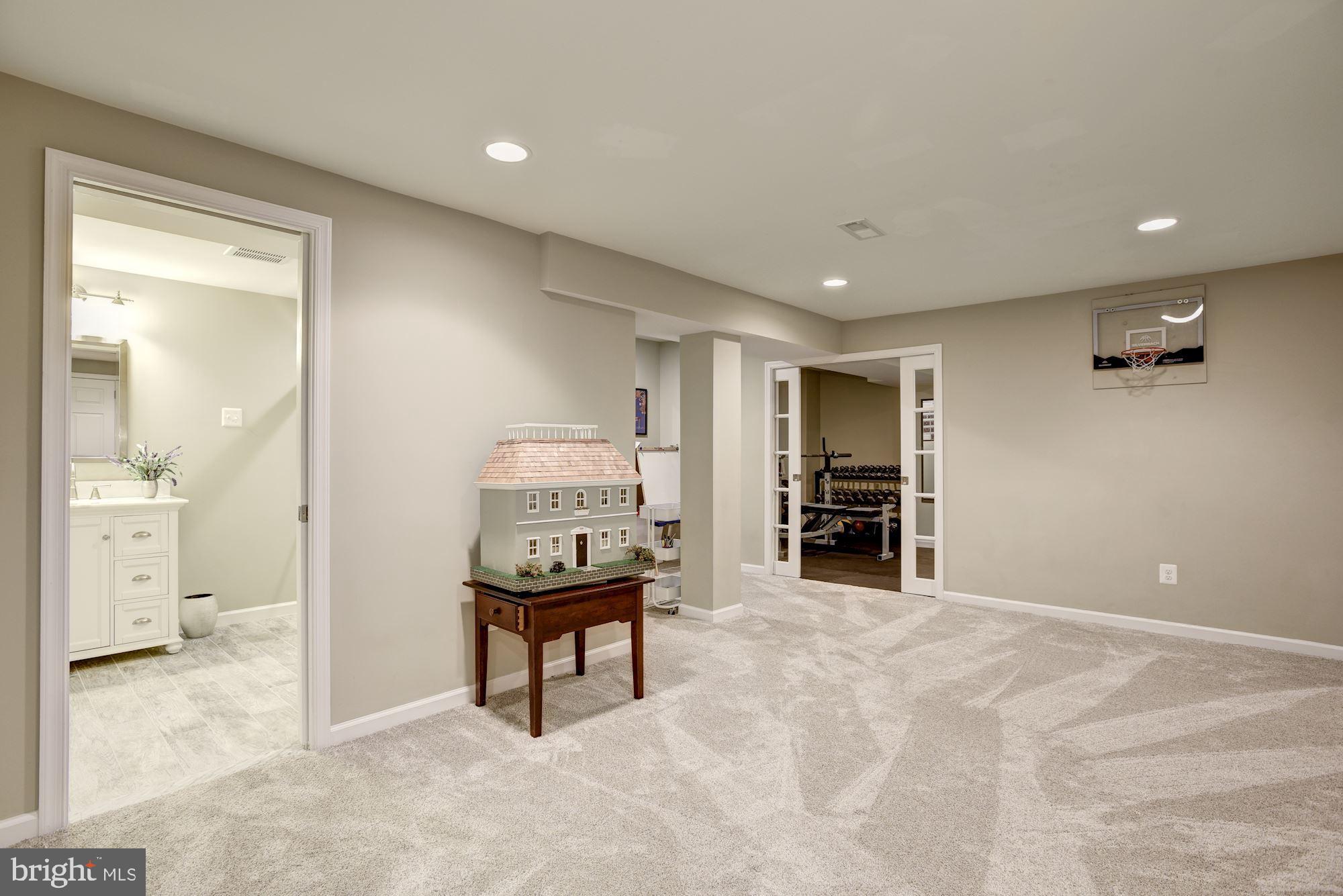923 Ridge Drive McLean, VA 22101 - Photo 49 of 78 French sliding doors to exercise room