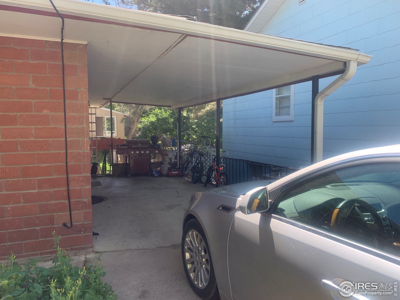 216 Filbert Street Wray, CO 80758 - Photo 2 of 7 Carport
