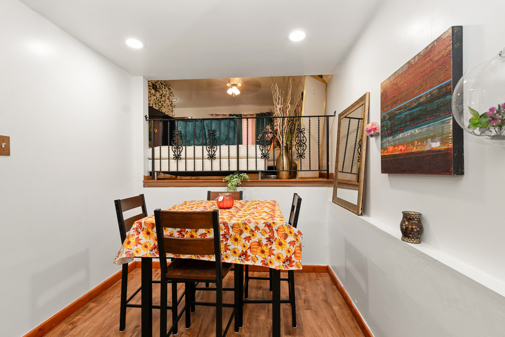 928 East 153rd Street Phoenix, IL 60426 - Photo 15 of 24 a dining room with furniture and wooden floor