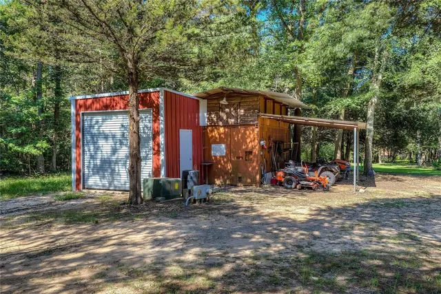 a view of a house with a big yard