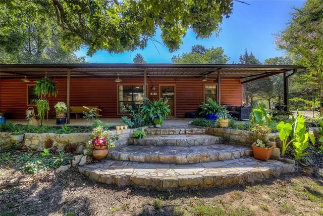 a view of a porch with furniture and floor