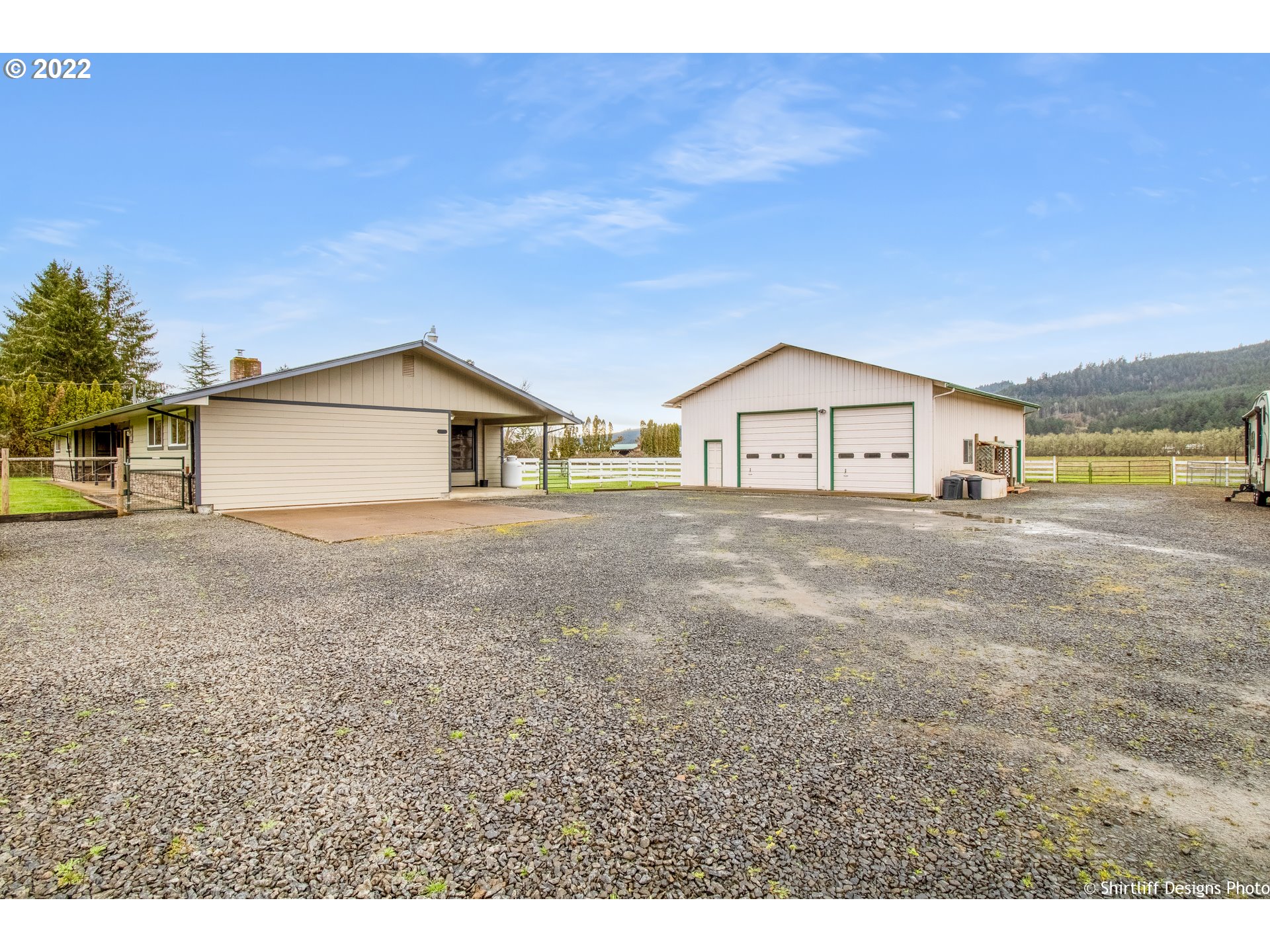 90818 Marcola Road Springfield, OR 97478 - Photo 2 of 32 a view of a house with a yard and a large tree