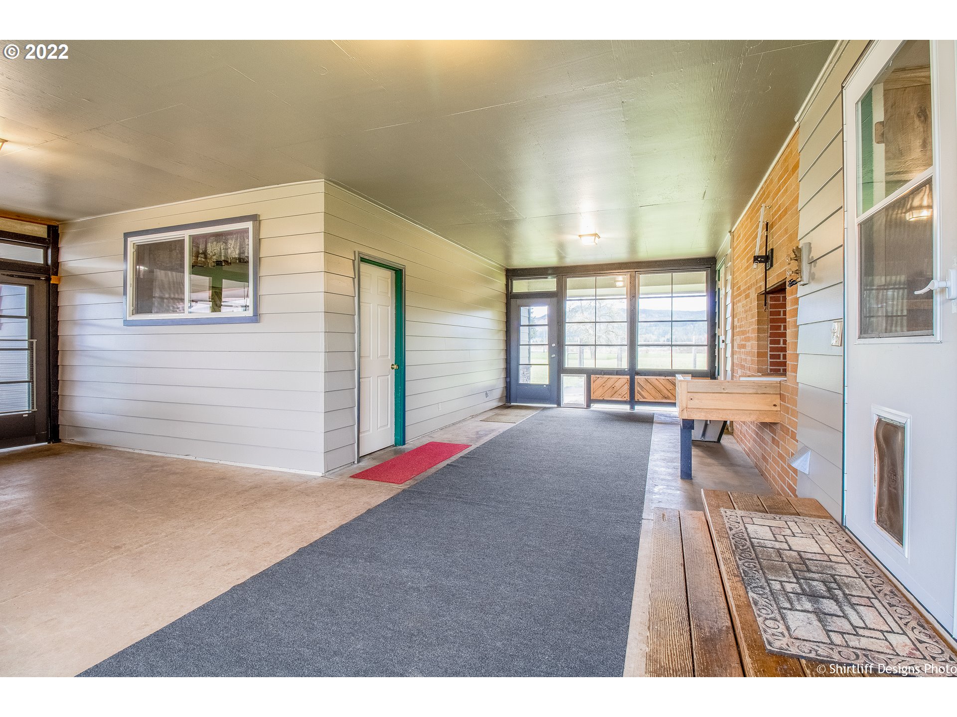 90818 Marcola Road Springfield, OR 97478 - Photo 25 of 32 a bedroom with a bed and a large window