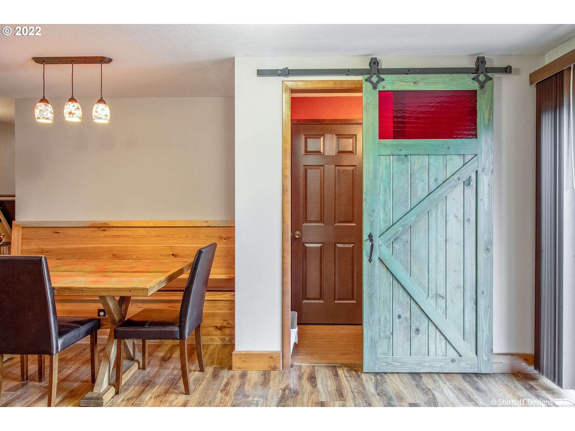 90818 Marcola Road Springfield, OR 97478 - Photo 9 of 32 a view of a dining room with furniture and a chandelier