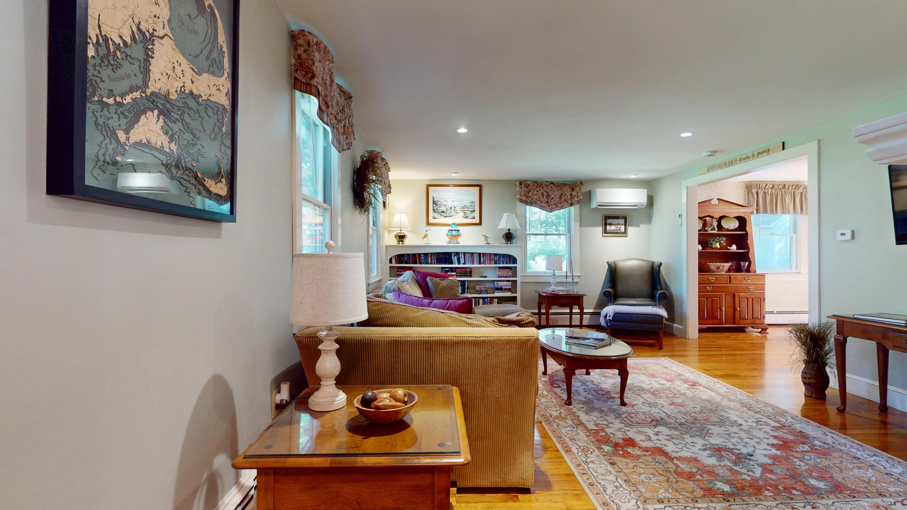 2 Longview Drive Centerville, MA 02632 - Photo 12 of 45 a living room with furniture and a wooden floor