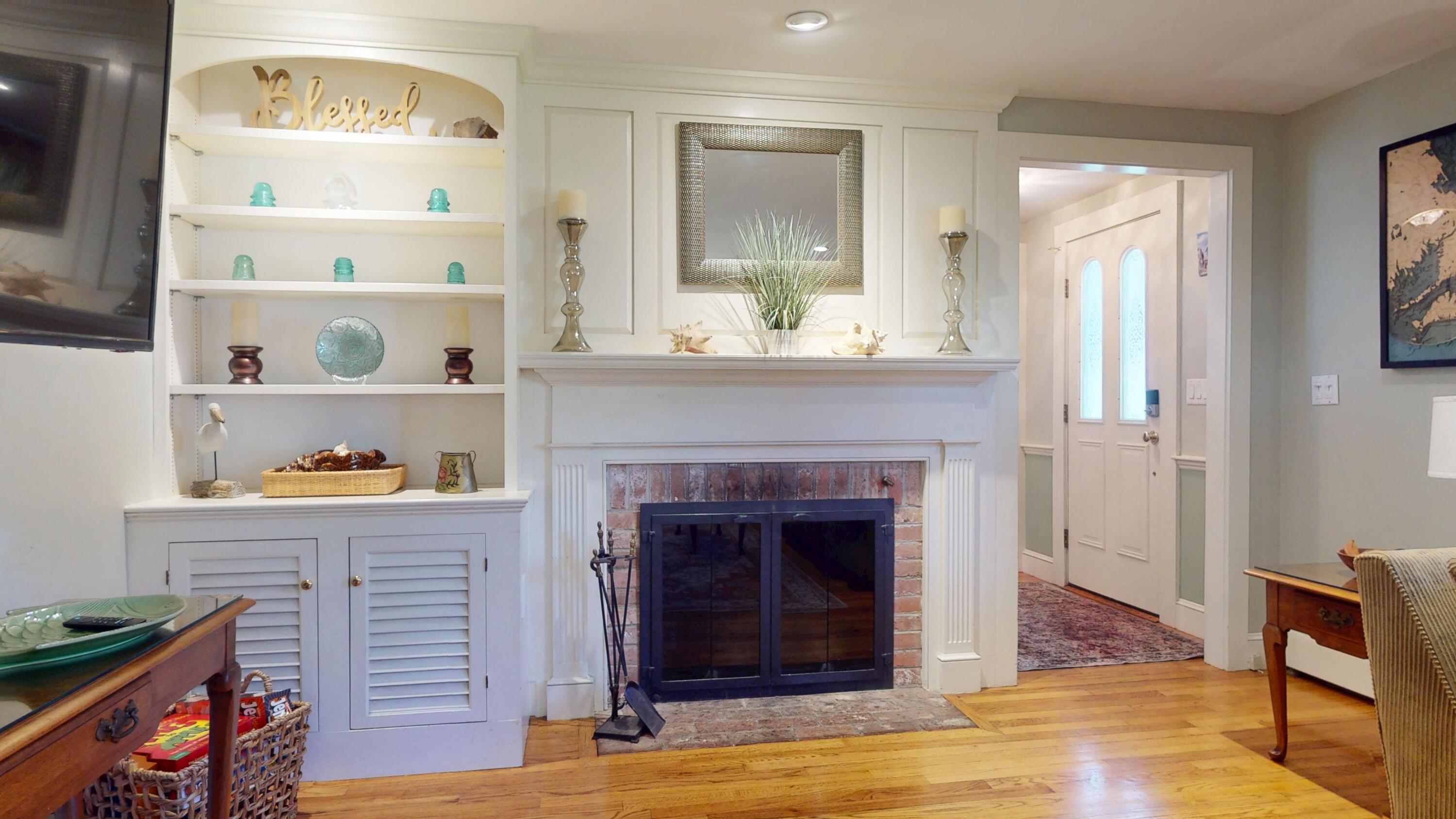 2 Longview Drive Centerville, MA 02632 - Photo 15 of 45 a living room with furniture and a fireplace