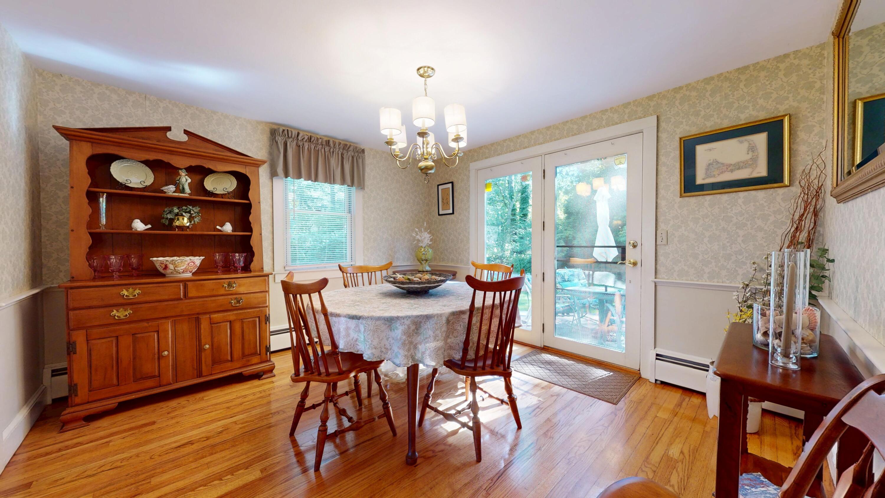 2 Longview Drive Centerville, MA 02632 - Photo 18 of 45 a view of a dining room with furniture window and wooden floor