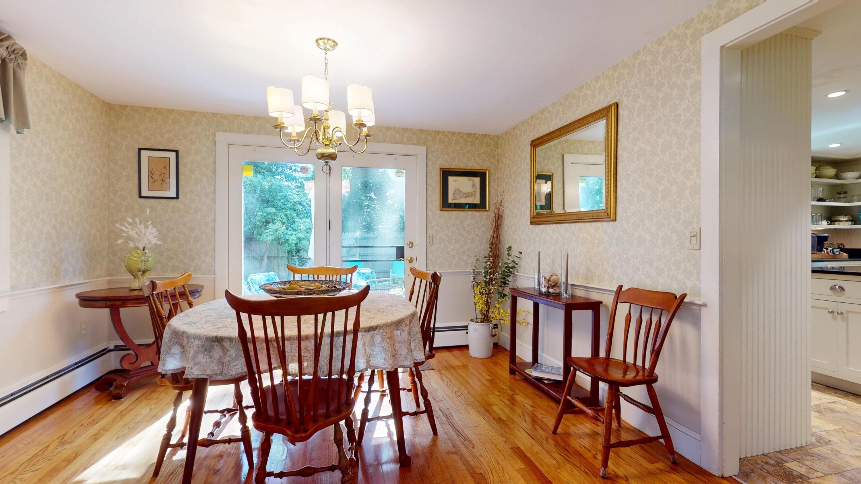 2 Longview Drive Centerville, MA 02632 - Photo 19 of 45 a view of a dining room with furniture window and wooden floor