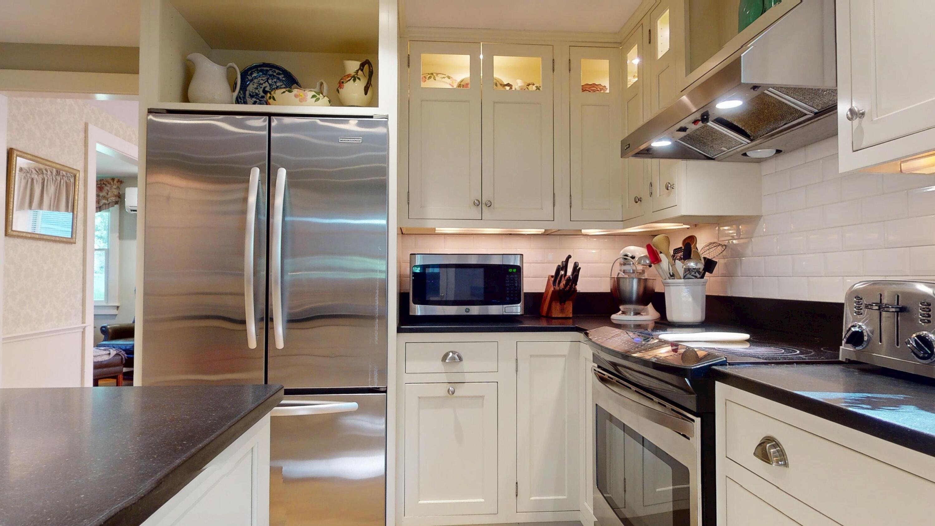 2 Longview Drive Centerville, MA 02632 - Photo 26 of 45 a kitchen with stainless steel appliances granite countertop a refrigerator a stove and a refrigerator