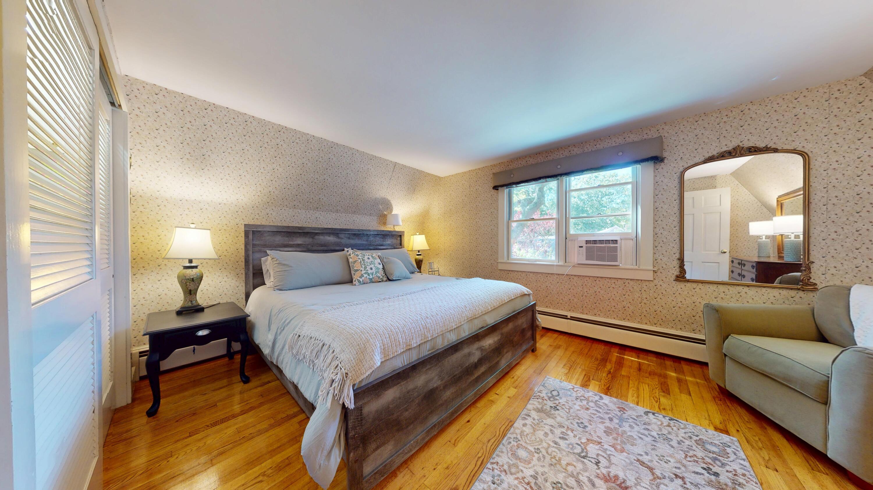 2 Longview Drive Centerville, MA 02632 - Photo 30 of 45 a bedroom with a bed couch and a window with outer view