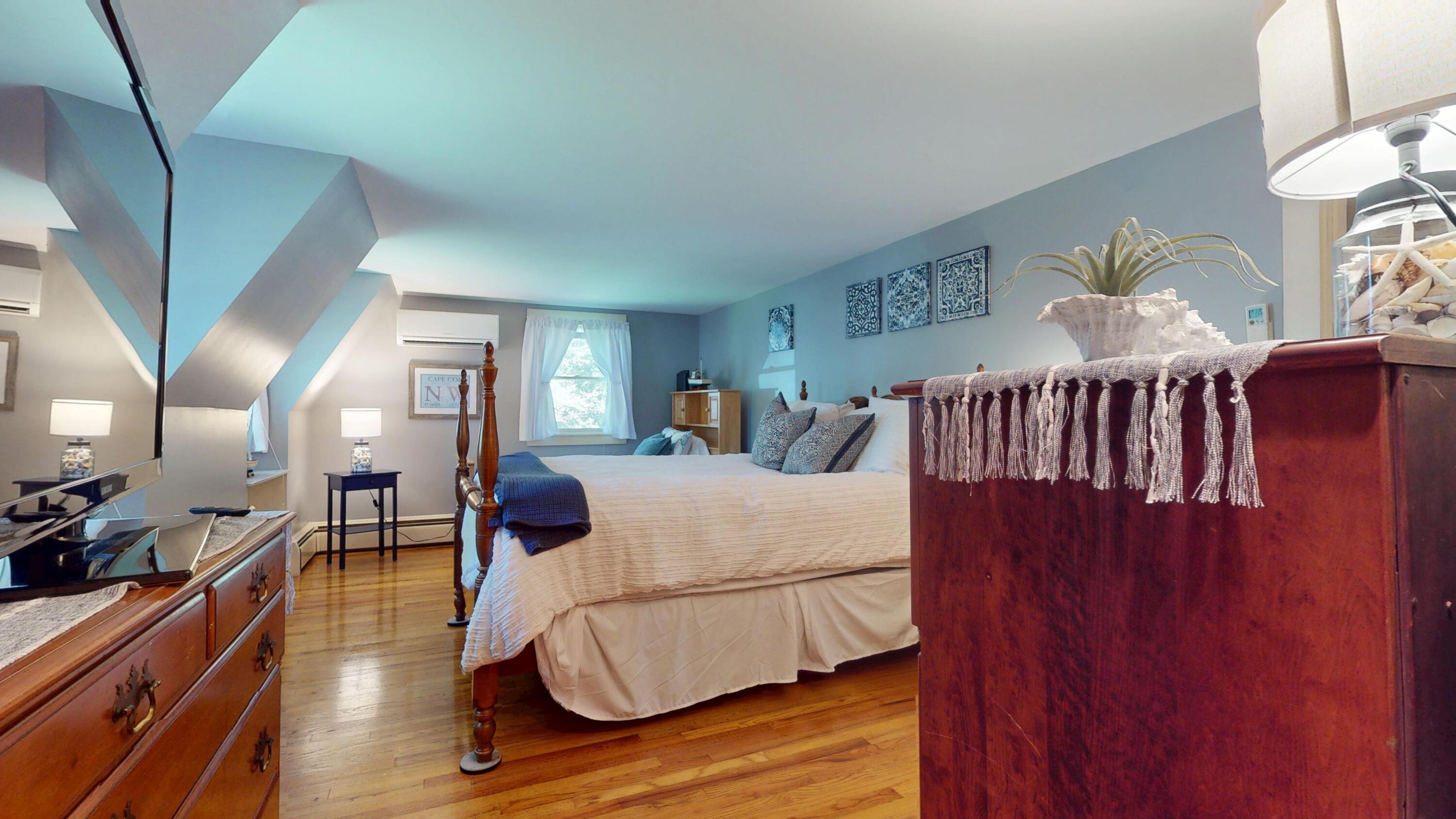 2 Longview Drive Centerville, MA 02632 - Photo 35 of 45 a bedroom with furniture and wooden floor