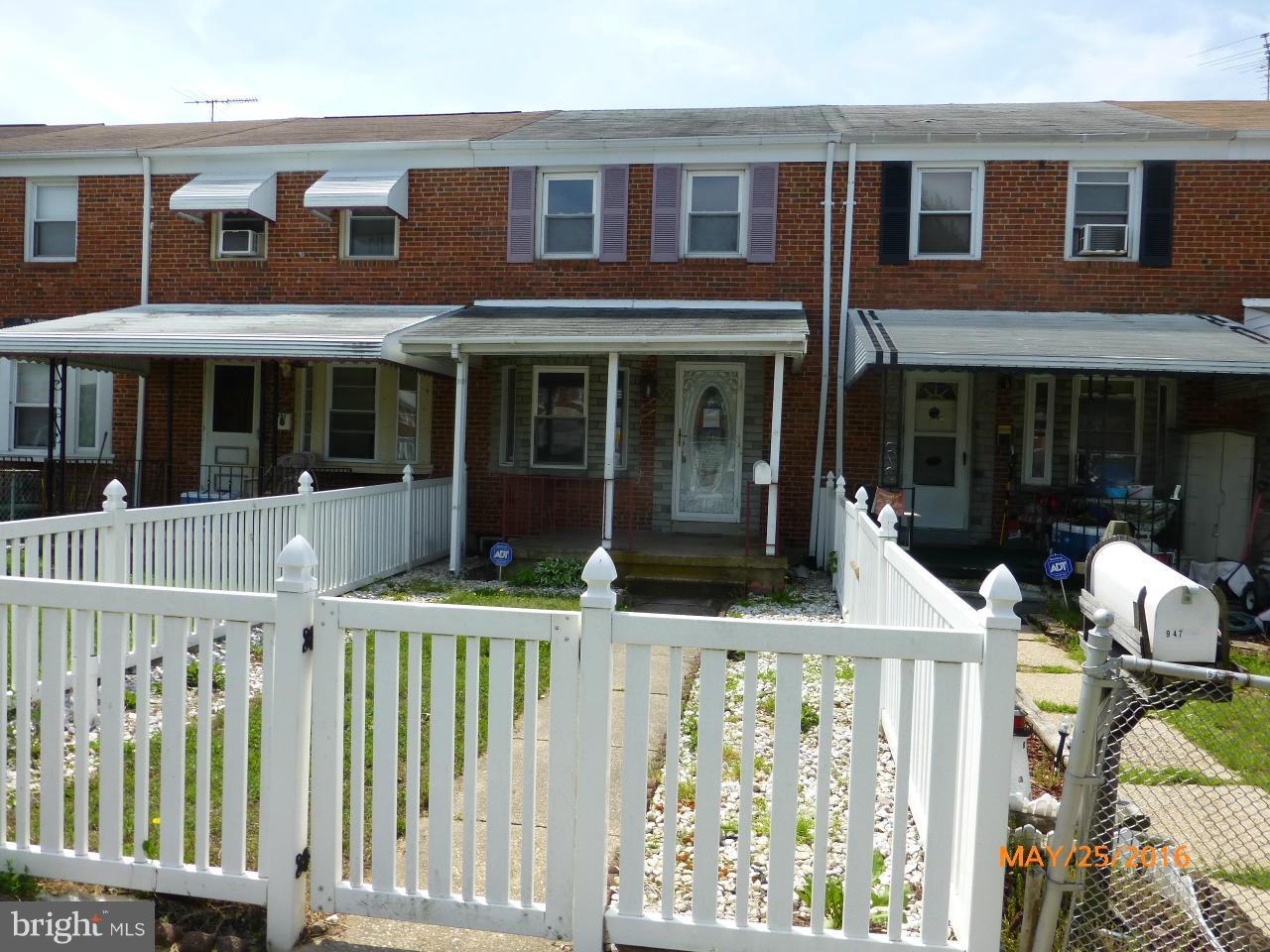 949 Middlesex Road Baltimore, MD 21221 - Photo 1 of 17 front view of white house with a large window
