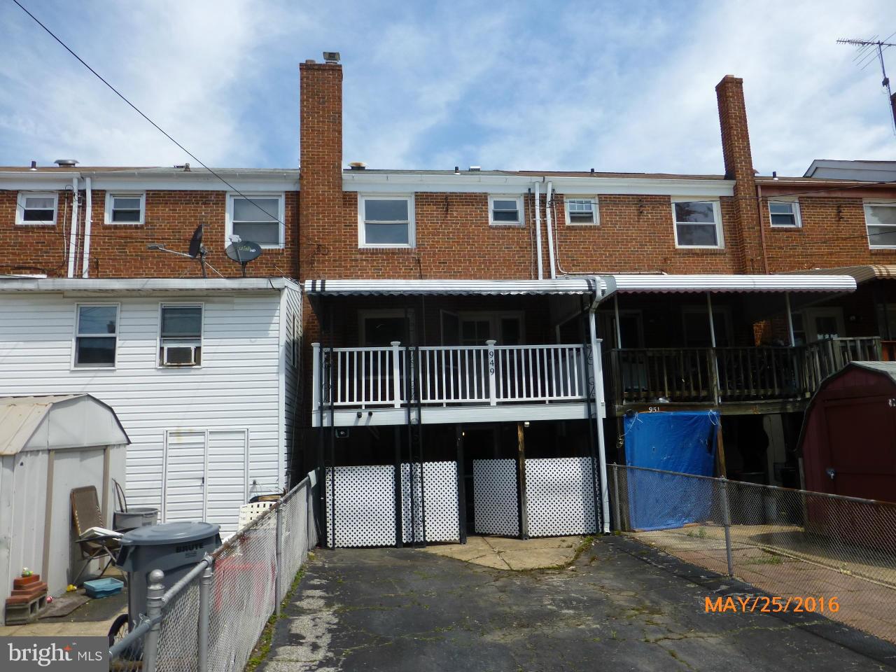 949 Middlesex Road Baltimore, MD 21221 - Photo 3 of 17 a front view of a house with a balcony