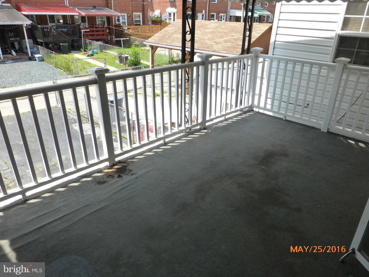 949 Middlesex Road Baltimore, MD 21221 - Photo 4 of 17 a view of a street from a balcony