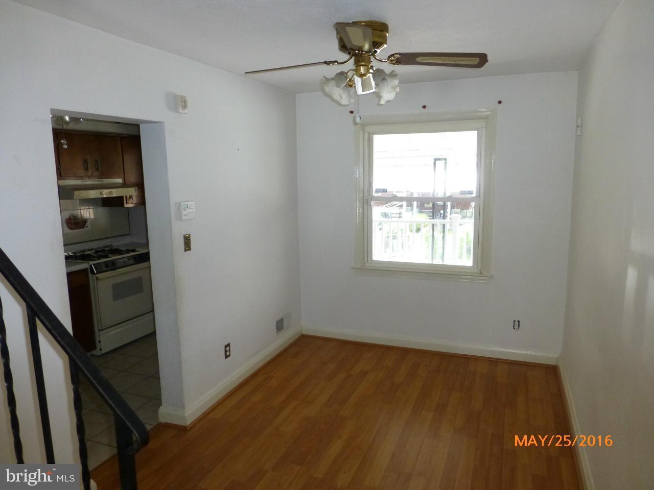 949 Middlesex Road Baltimore, MD 21221 - Photo 10 of 17 a view of an empty room with a window