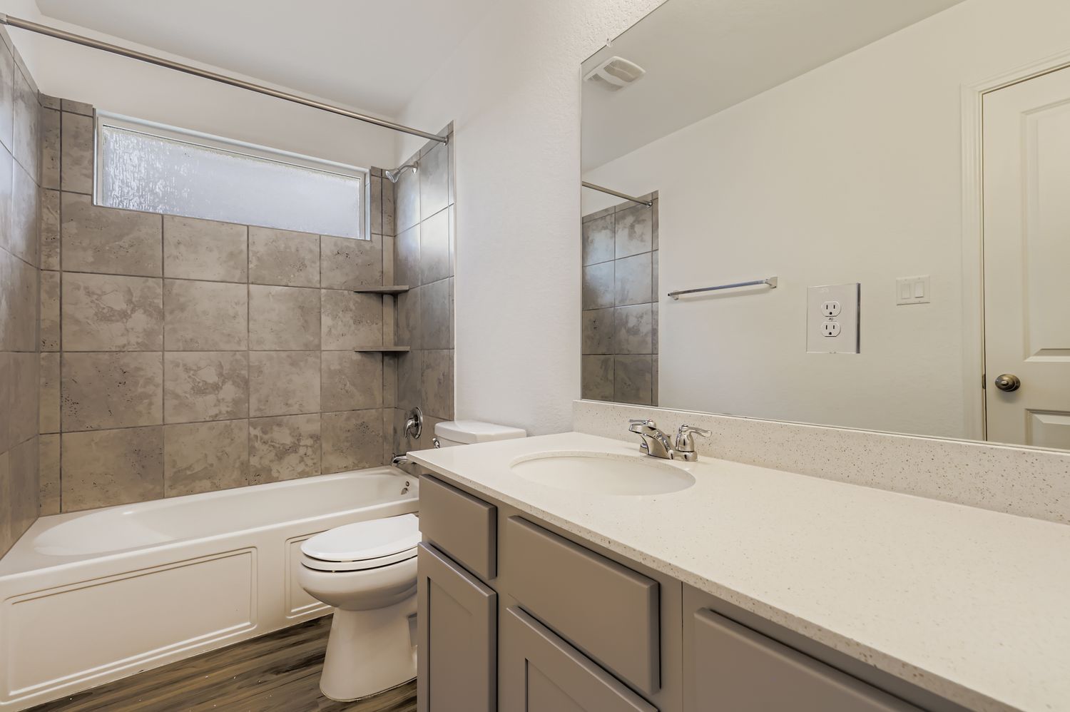 128 Concho Brook Bend Georgetown, TX 78626 - Photo 17 of 28 a bathroom with a sink a toilet and shower