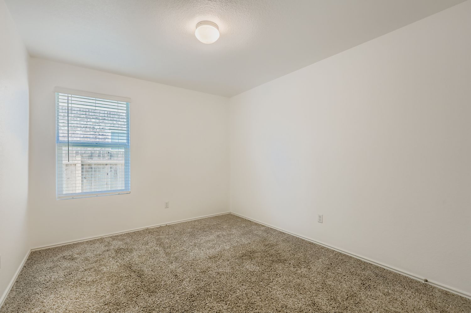 128 Concho Brook Bend Georgetown, TX 78626 - Photo 18 of 28 an empty room with a window