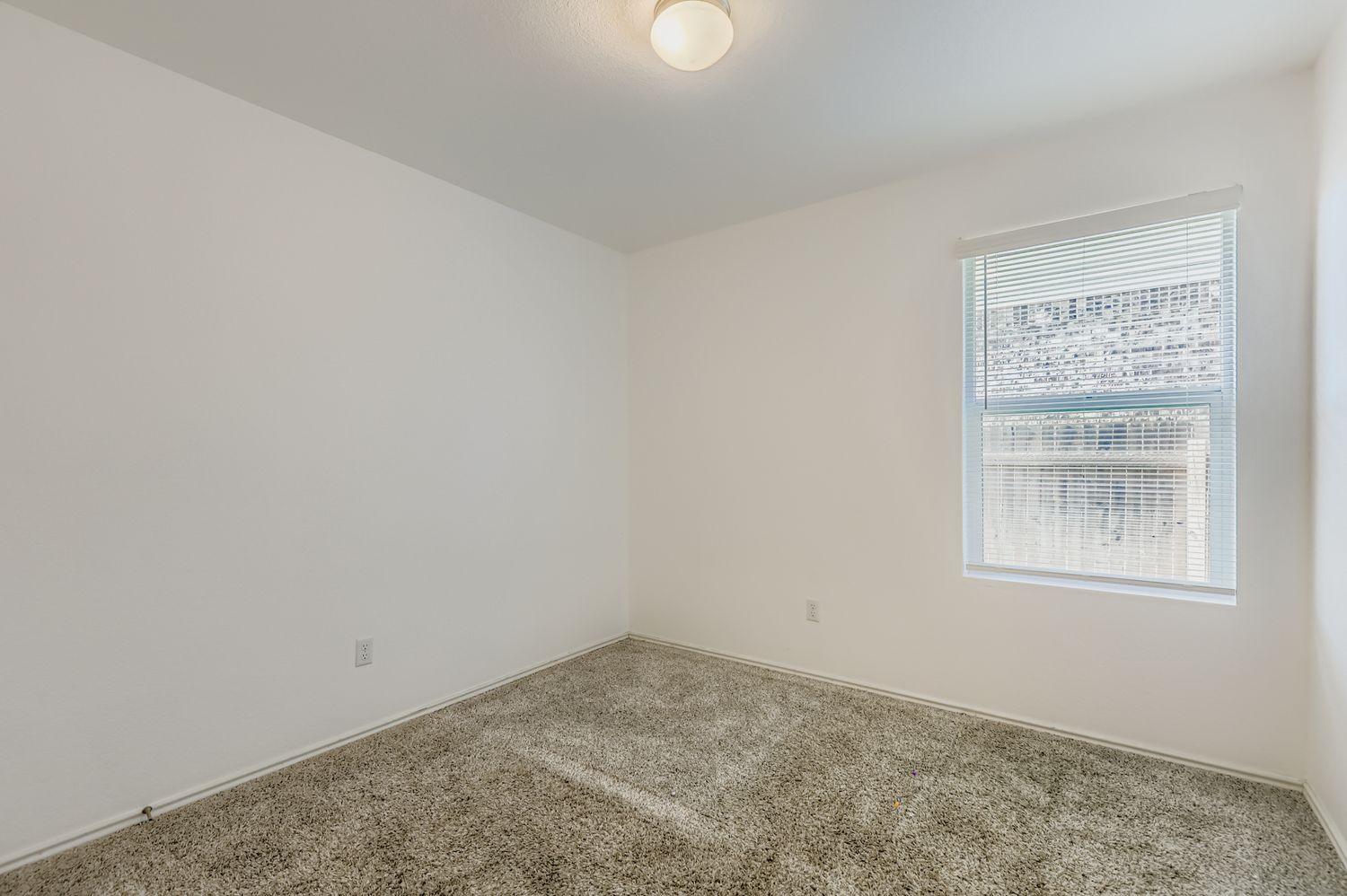 128 Concho Brook Bend Georgetown, TX 78626 - Photo 21 of 28 an empty room with a window