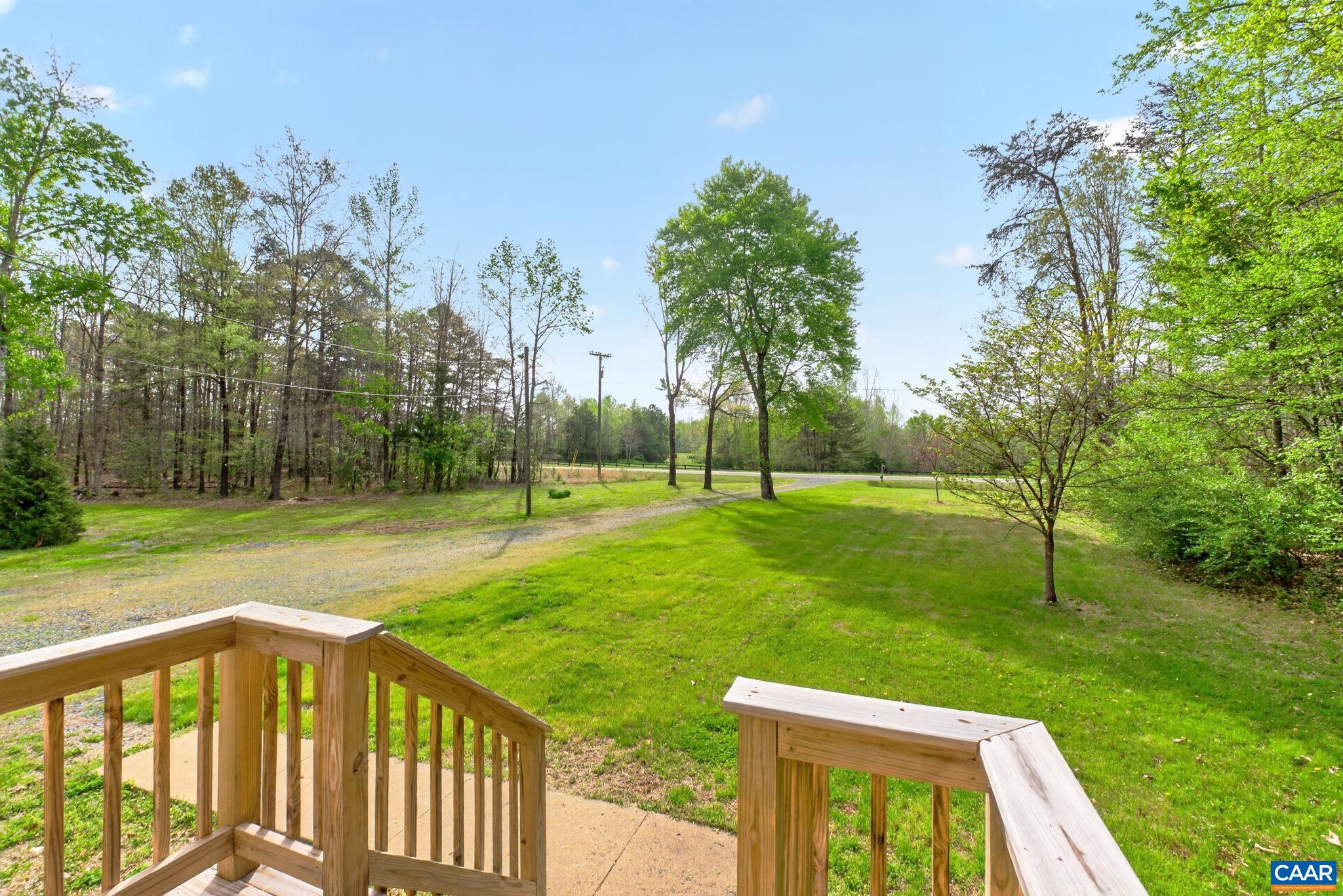 673 Cedar Lane Road Palmyra, VA 22963 - Photo 5 of 47 a view of a backyard with a garden
