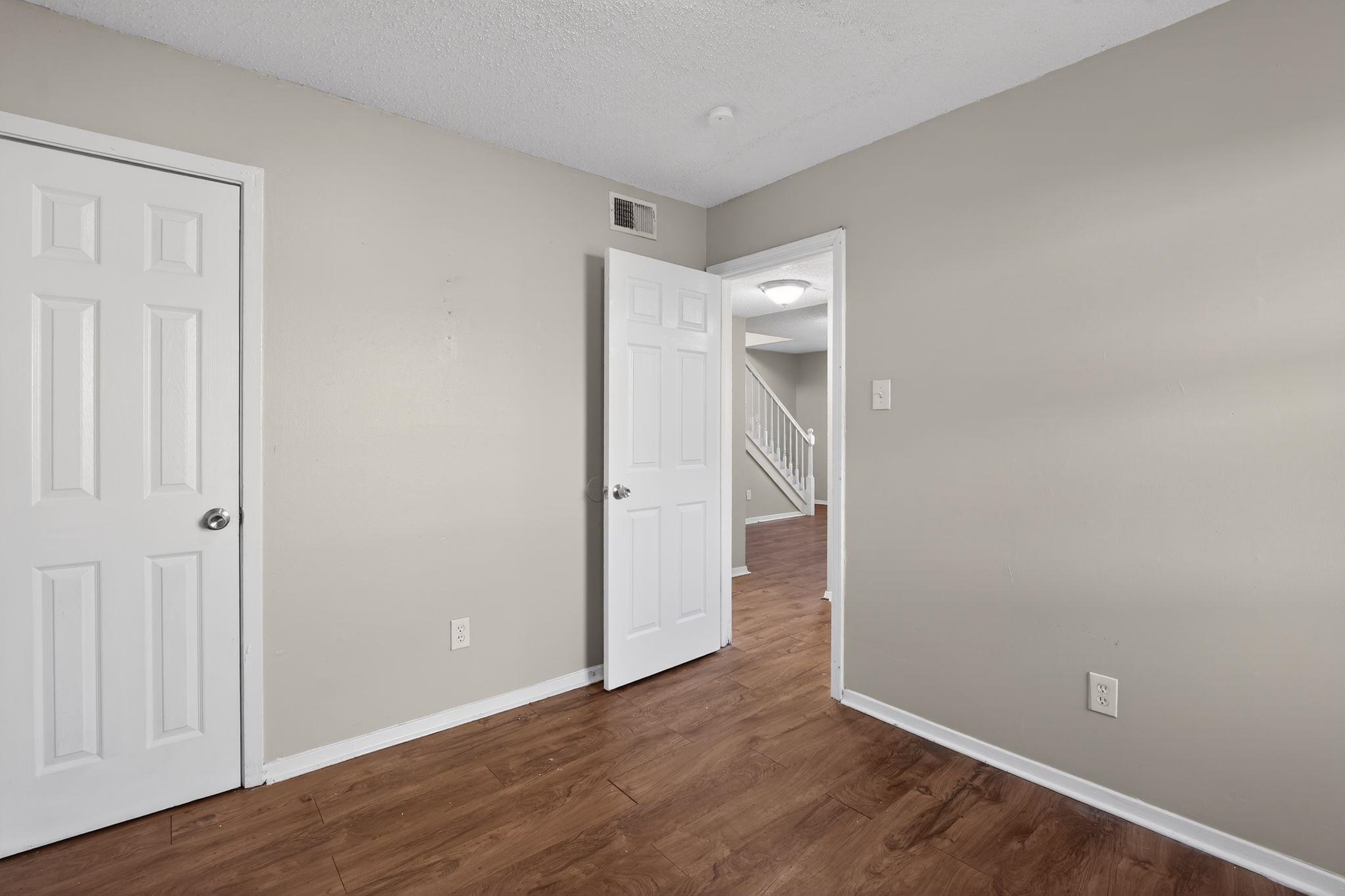 2449 Labonte Drive Memphis, TN 38127 - Photo 16 of 30 wooden floor in an empty room