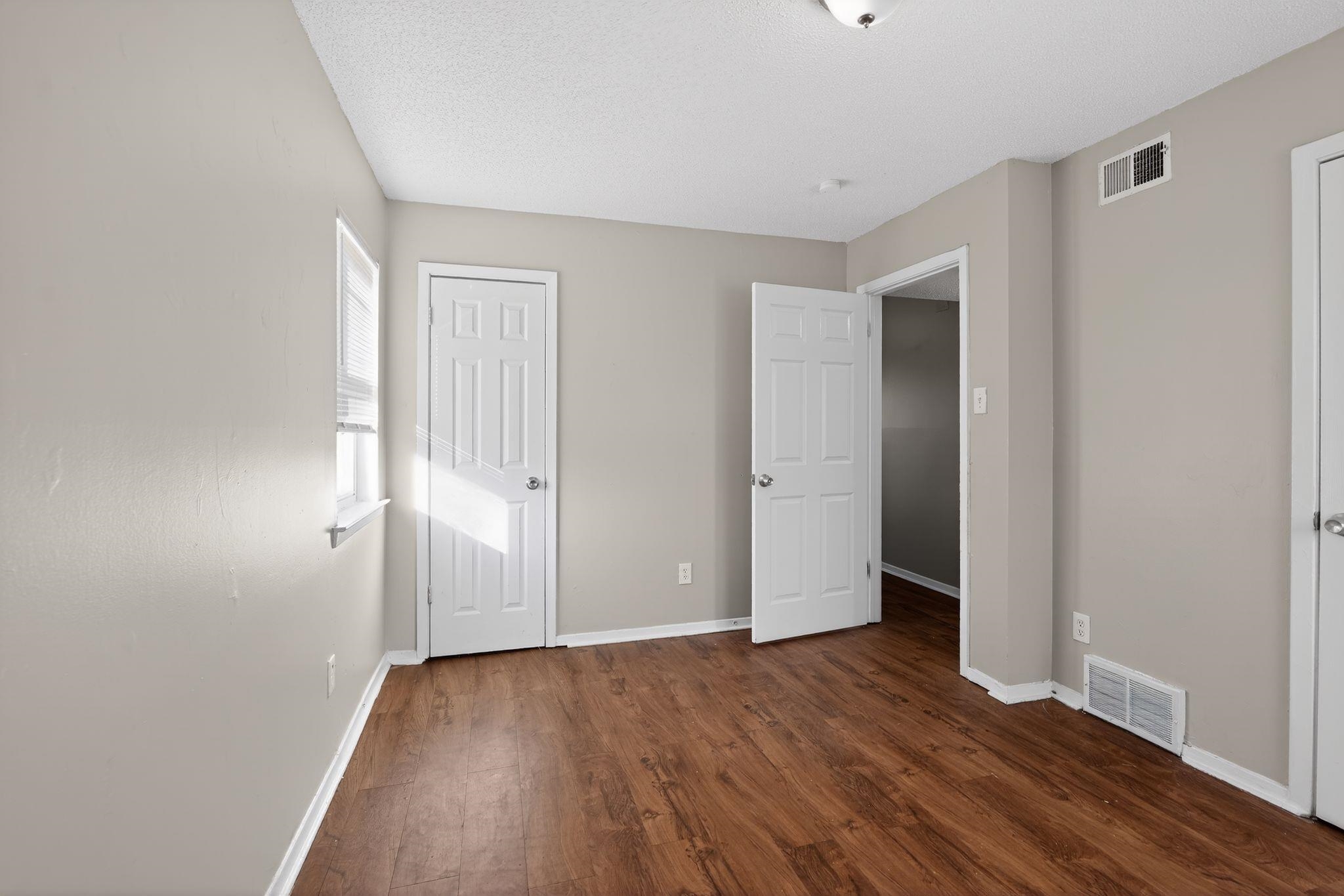 2449 Labonte Drive Memphis, TN 38127 - Photo 17 of 30 a view of an empty room with wooden floor