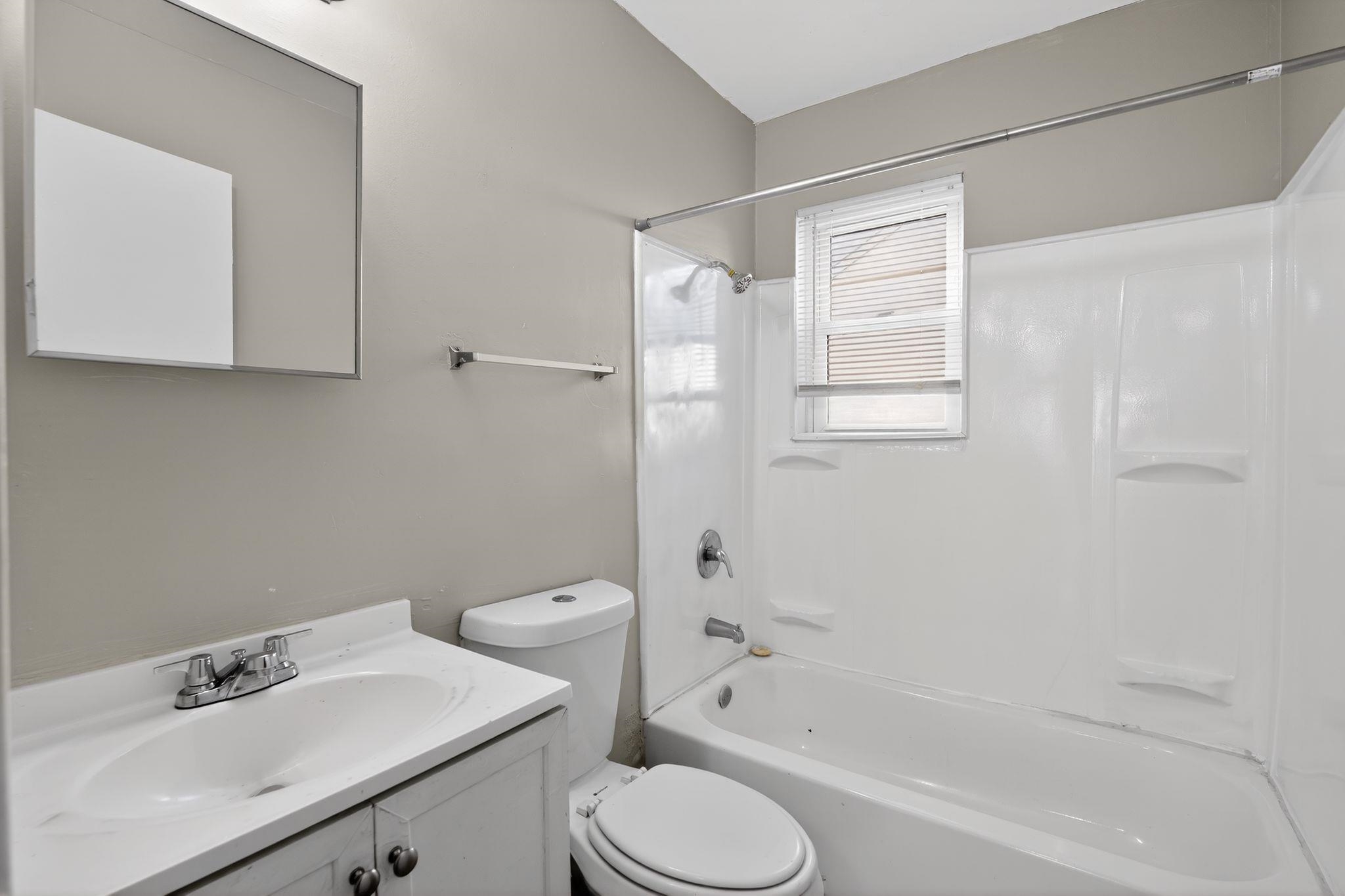2449 Labonte Drive Memphis, TN 38127 - Photo 22 of 30 a bathroom with a sink toilet and shower