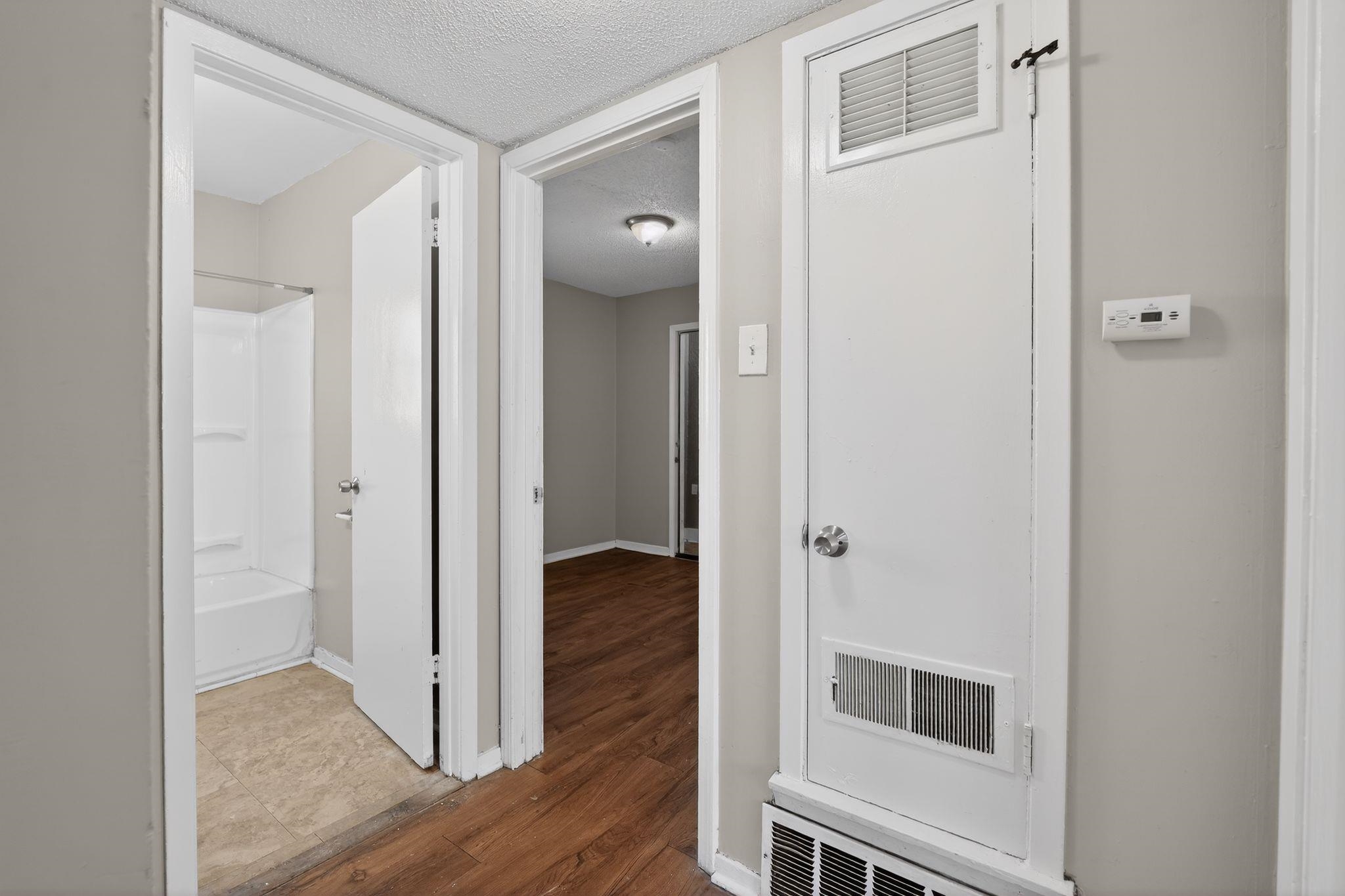 2449 Labonte Drive Memphis, TN 38127 - Photo 28 of 30 a view of a hallway with wooden floor and closet