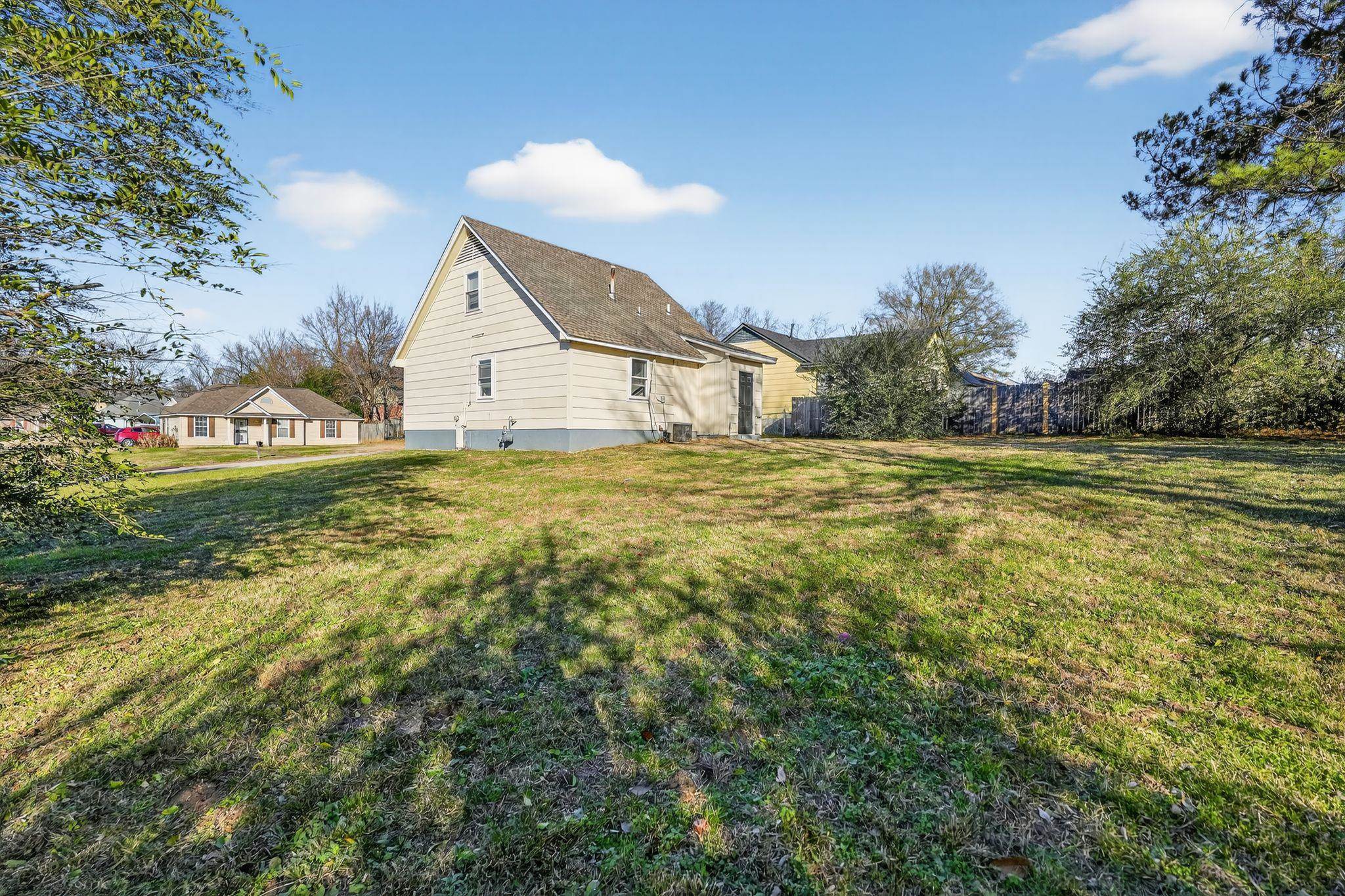 2449 Labonte Drive Memphis, TN 38127 - Photo 3 of 30 a view of big yard with a house in the background