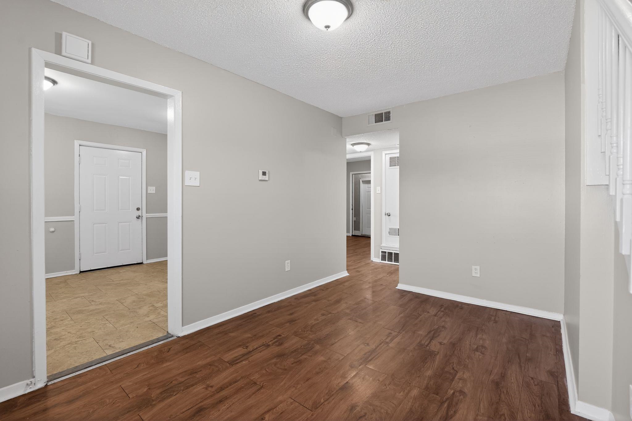 2449 Labonte Drive Memphis, TN 38127 - Photo 9 of 30 wooden floor in an empty room