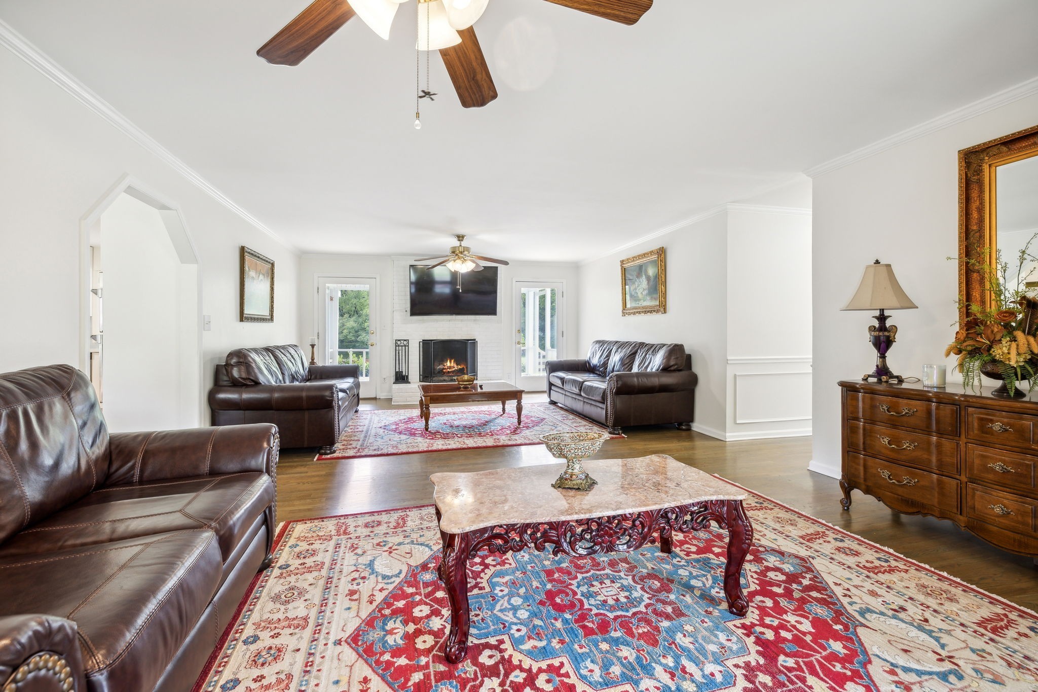 600 Blooming Grove Road Pulaski, TN 38478 - Photo 12 of 68 a living room with furniture a rug and a flat screen tv