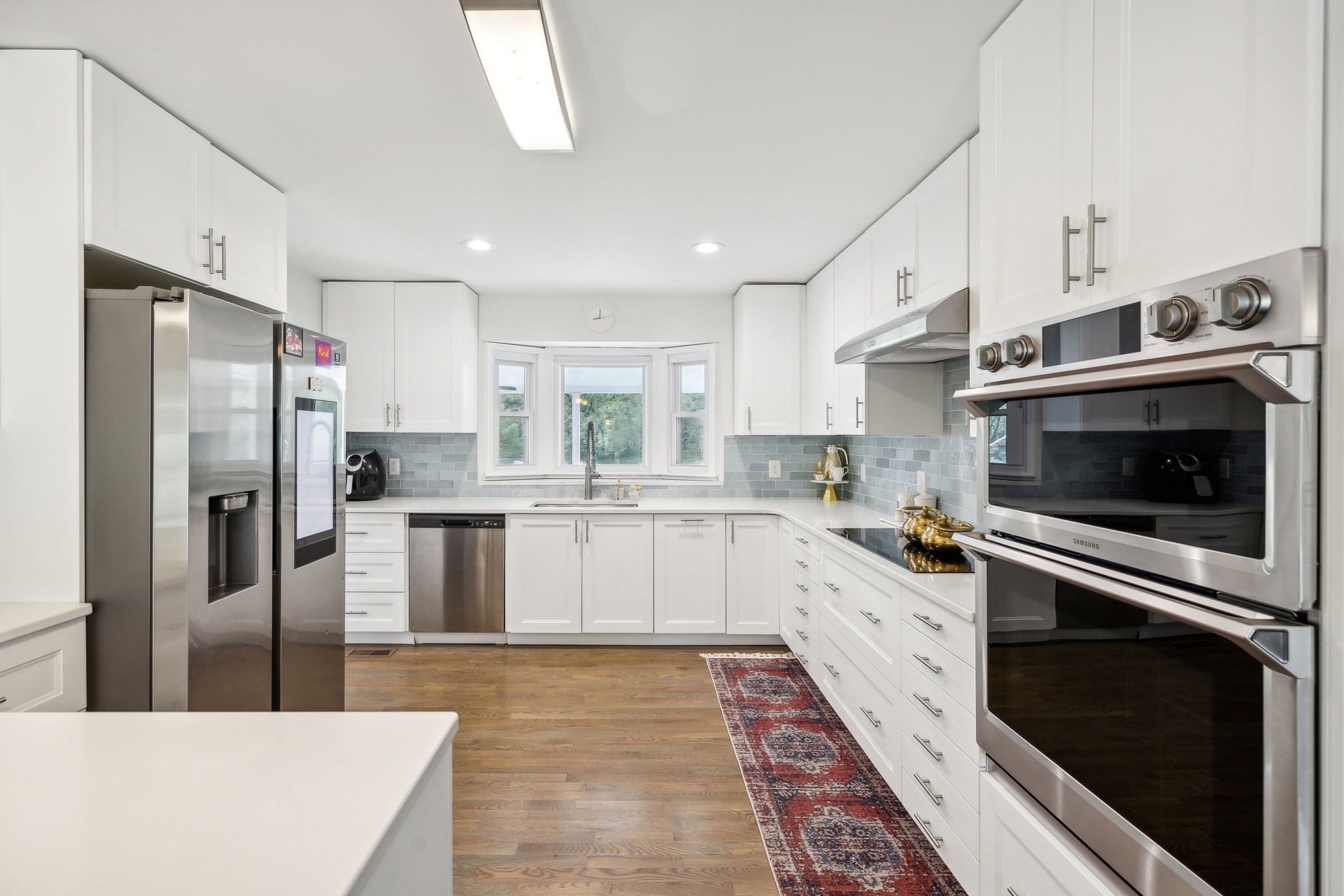 600 Blooming Grove Road Pulaski, TN 38478 - Photo 20 of 68 a kitchen with stainless steel appliances a refrigerator sink and microwave