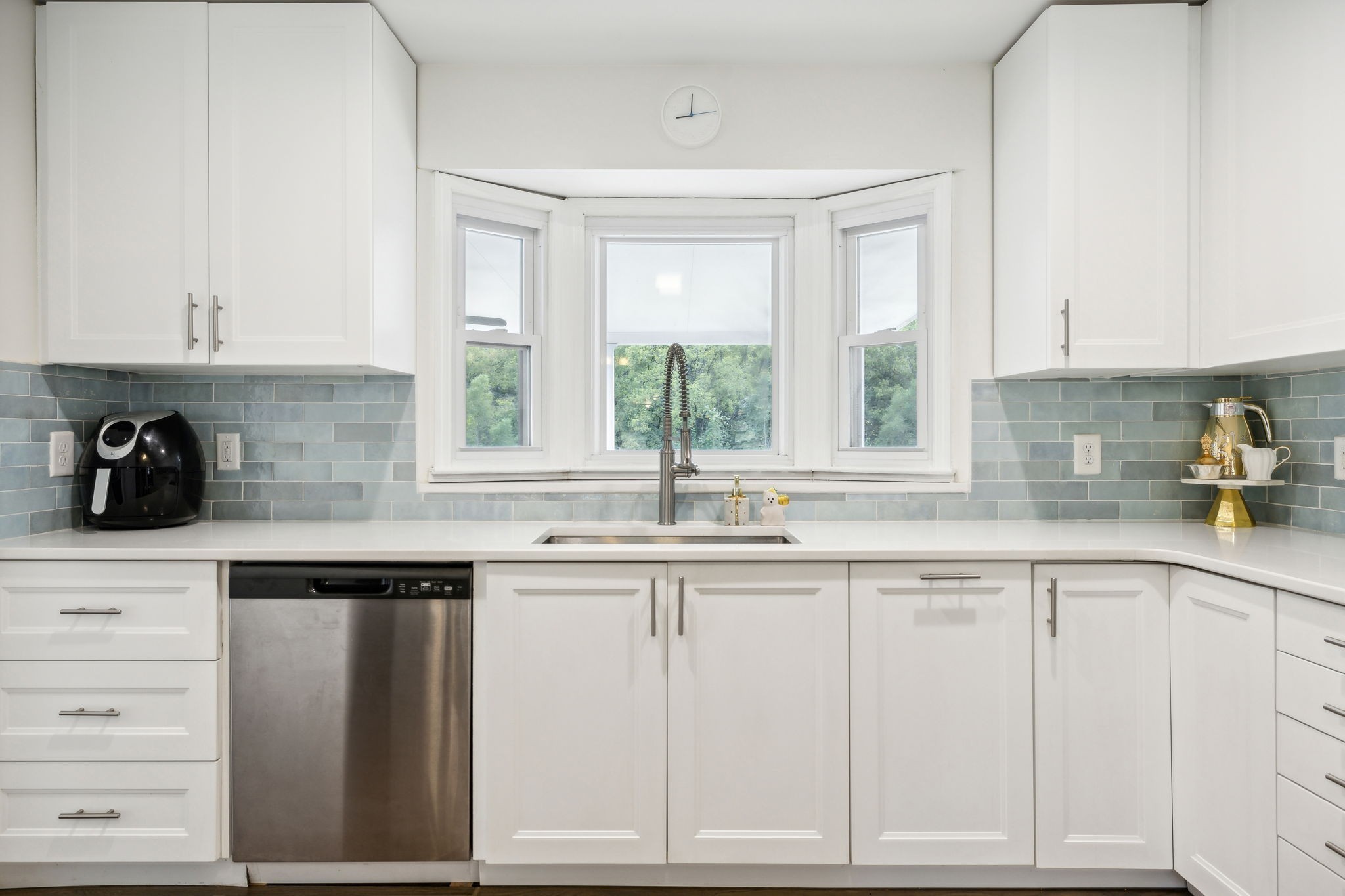 600 Blooming Grove Road Pulaski, TN 38478 - Photo 22 of 68 a kitchen with white cabinets and sink