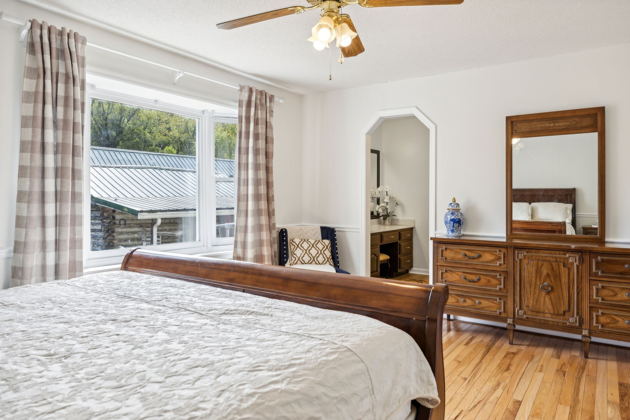 600 Blooming Grove Road Pulaski, TN 38478 - Photo 27 of 68 a bedroom with a large bed and a dresser