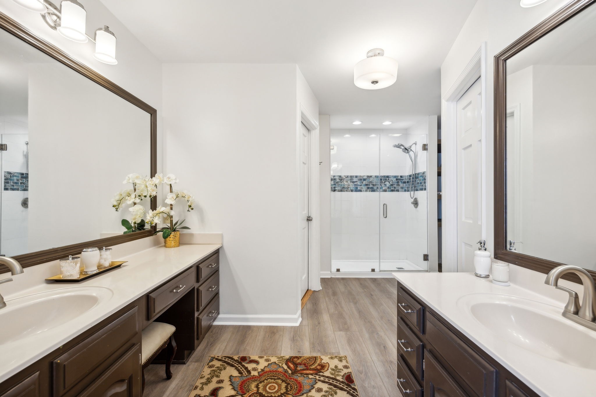 600 Blooming Grove Road Pulaski, TN 38478 - Photo 28 of 68 a spacious bathroom with a granite countertop sink a mirror and a bathtub