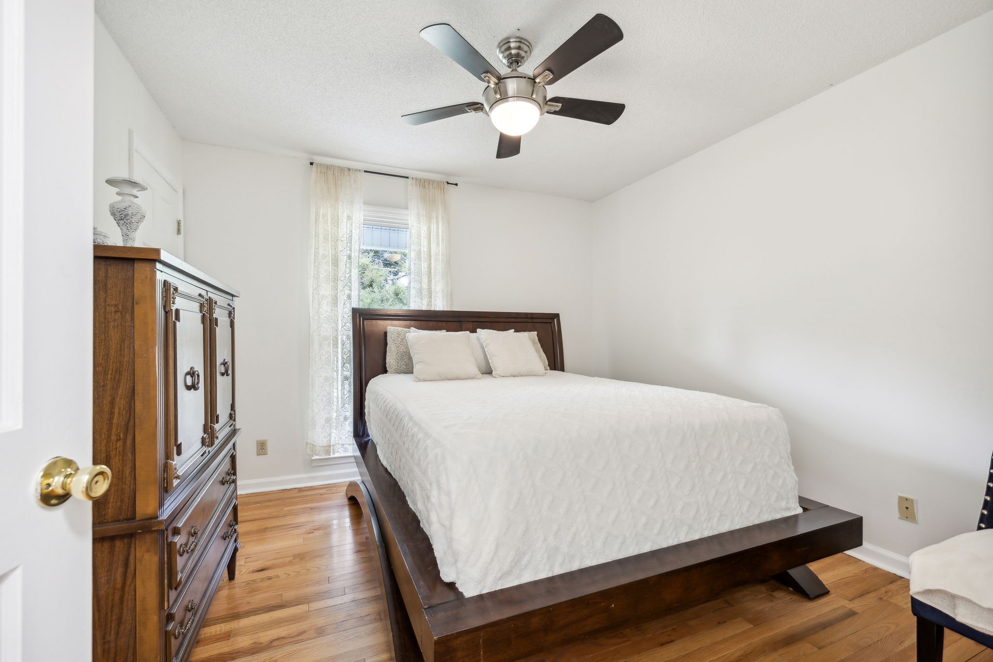 600 Blooming Grove Road Pulaski, TN 38478 - Photo 31 of 68 a bedroom with a bed and wooden floor
