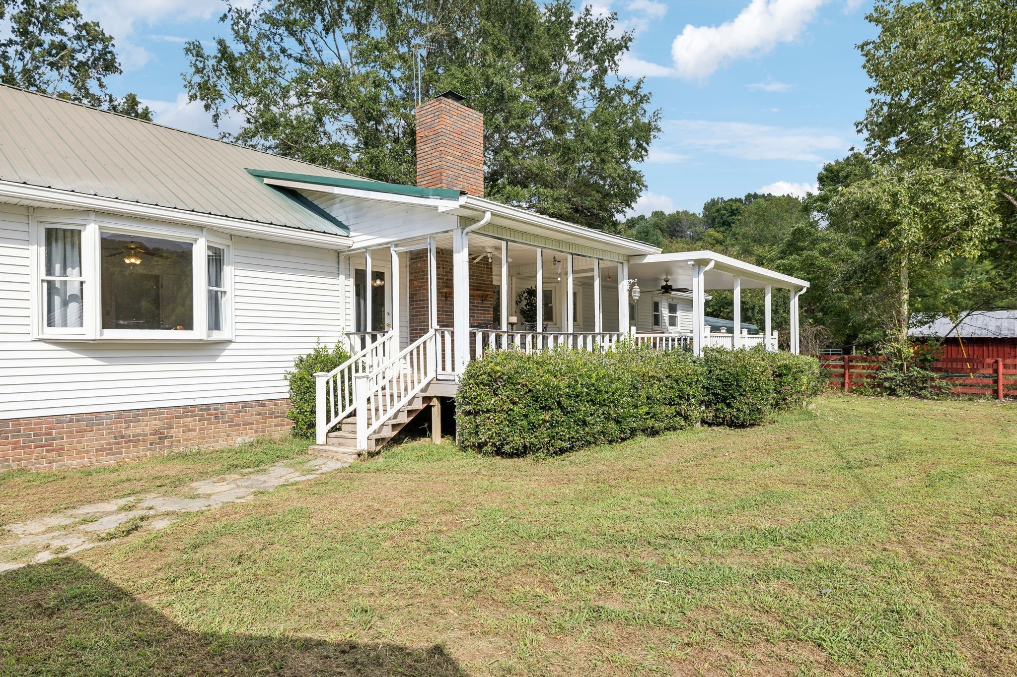 600 Blooming Grove Road Pulaski, TN 38478 - Photo 4 of 68 a front view of a house with a yard