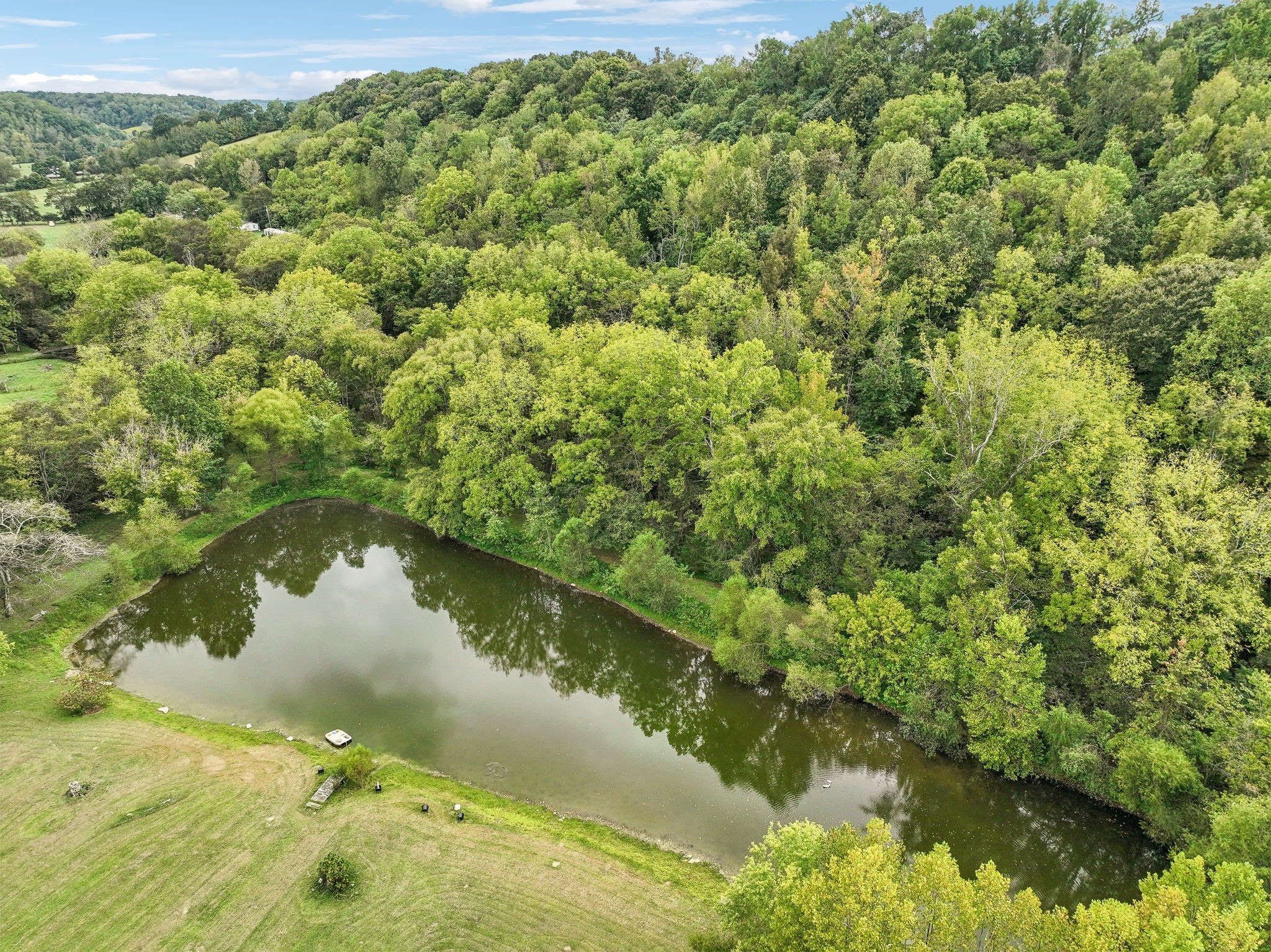 600 Blooming Grove Road Pulaski, TN 38478 - Photo 48 of 68 a view of a lake from a yard