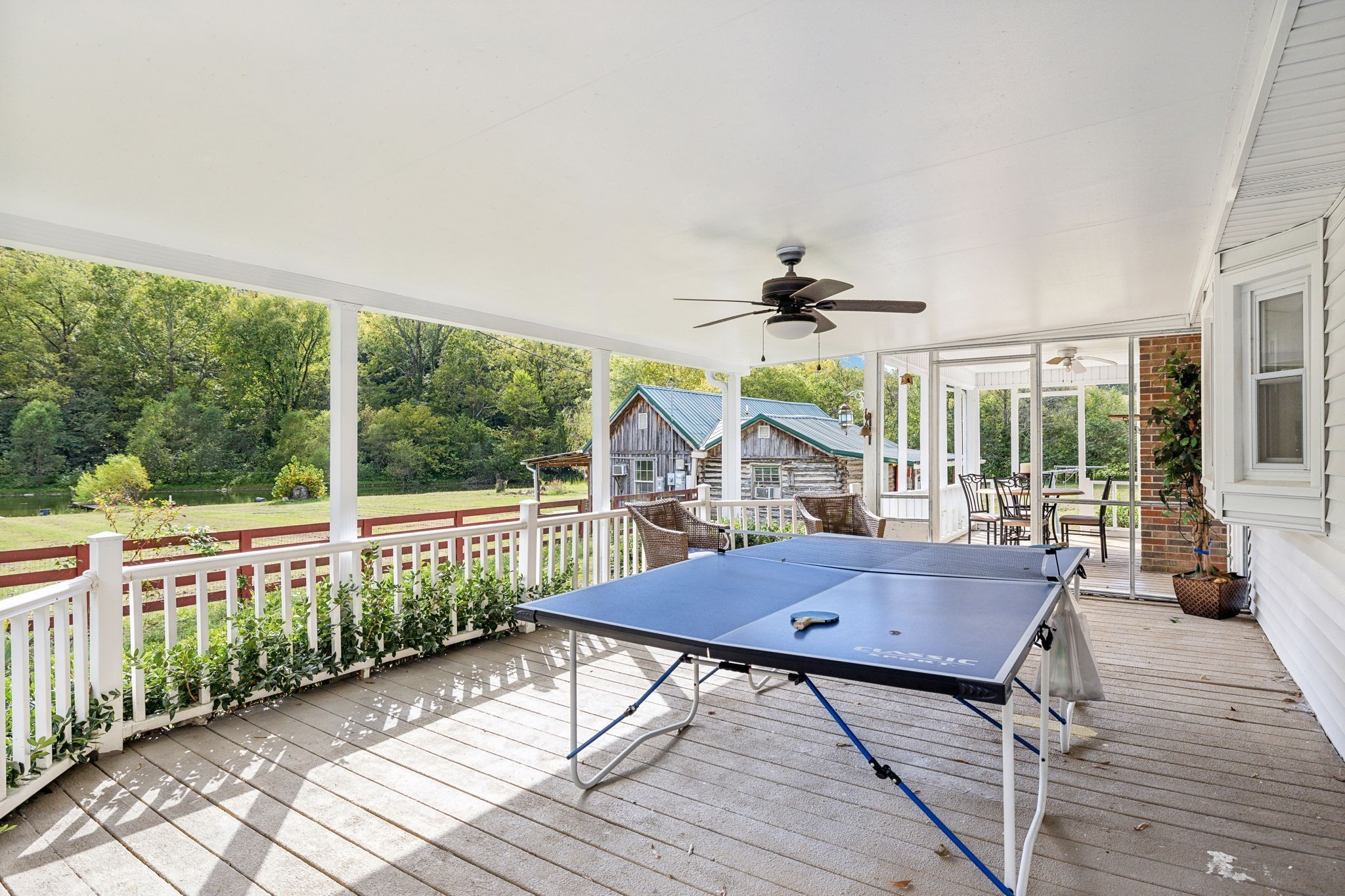 600 Blooming Grove Road Pulaski, TN 38478 - Photo 65 of 68 a view of a roof deck with wooden floor and fence