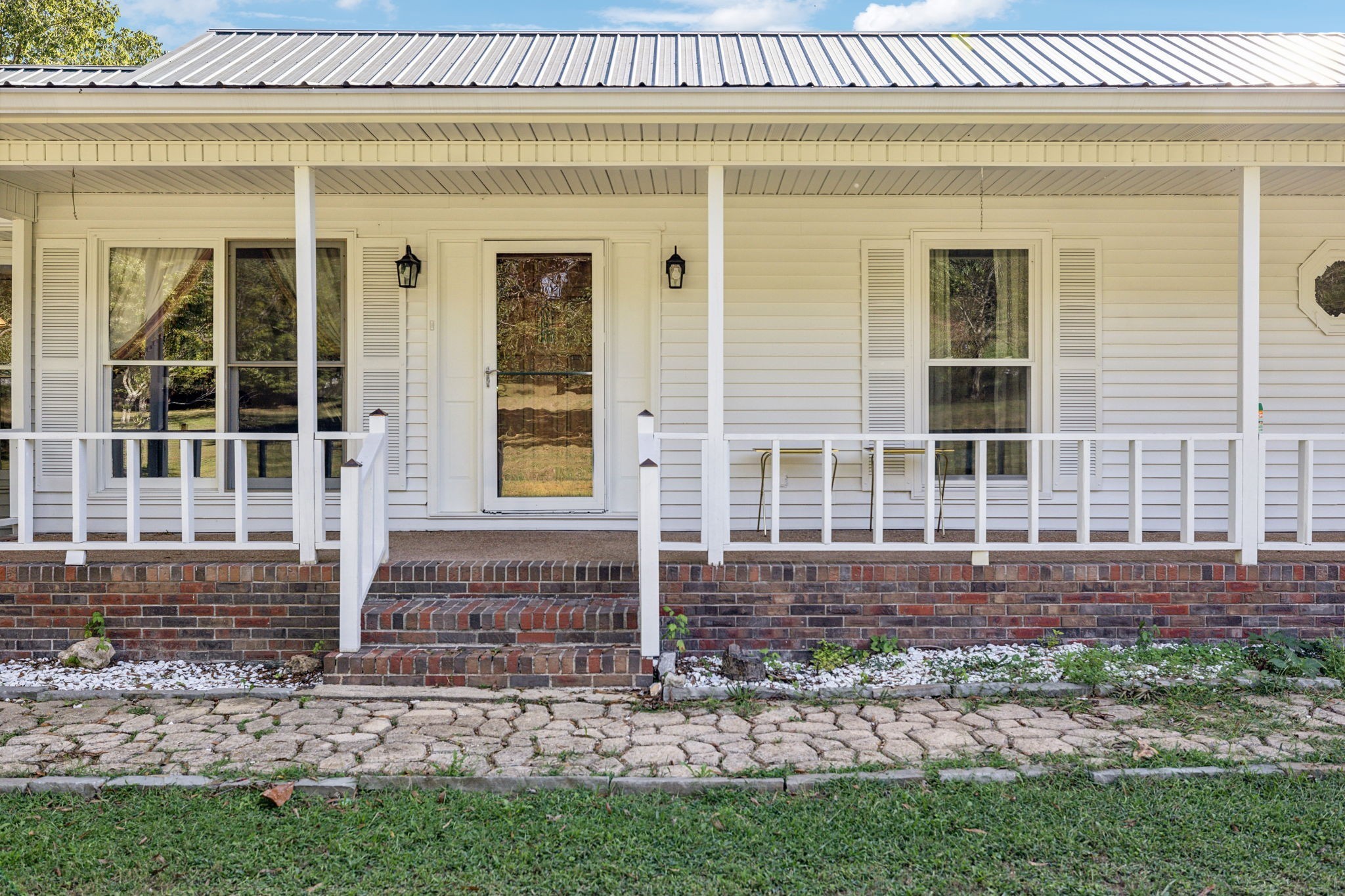 600 Blooming Grove Road Pulaski, TN 38478 - Photo 7 of 68 front view of a house with a yard