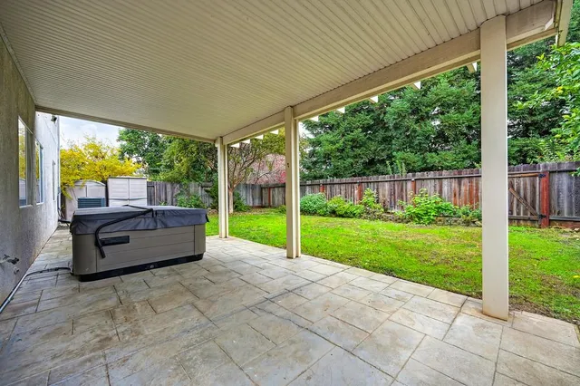 a view of outdoor space with wooden walls