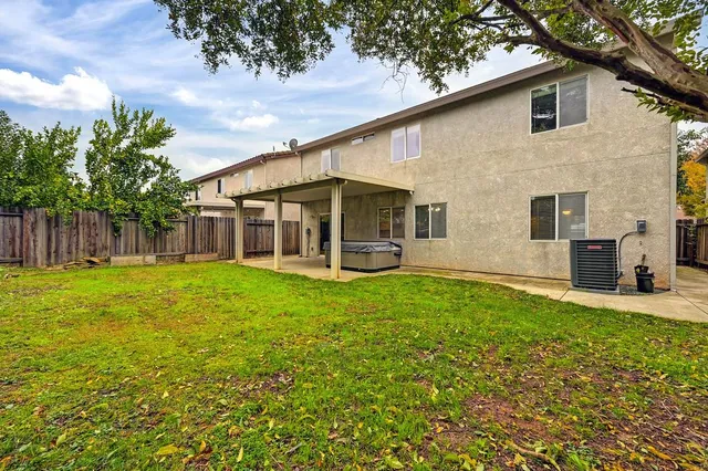 a garden with wooden fence