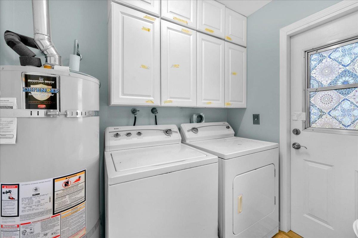 26982 Twin Ponds Road Clovis, CA 93619 - Photo 17 of 48 a view of storage and utility room with washer and dryer