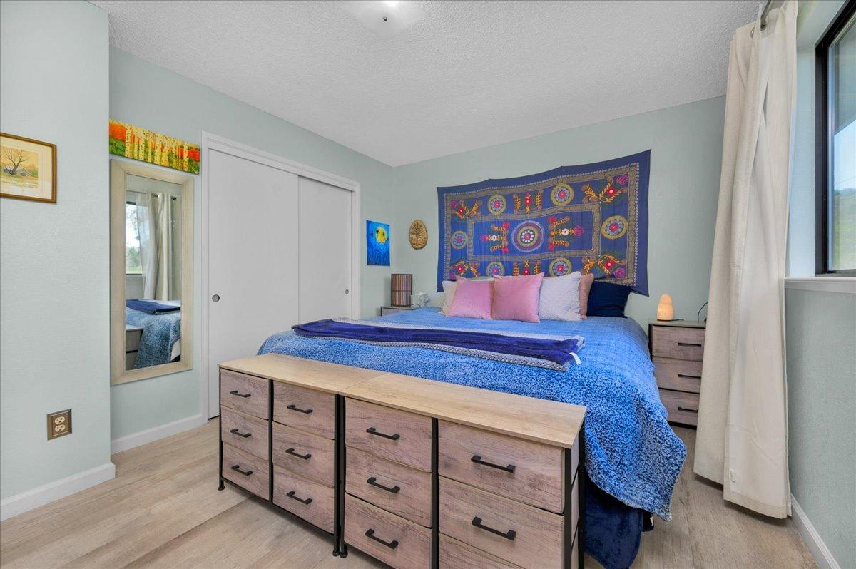 26982 Twin Ponds Road Clovis, CA 93619 - Photo 24 of 48 a bed room with a bed and a dresser