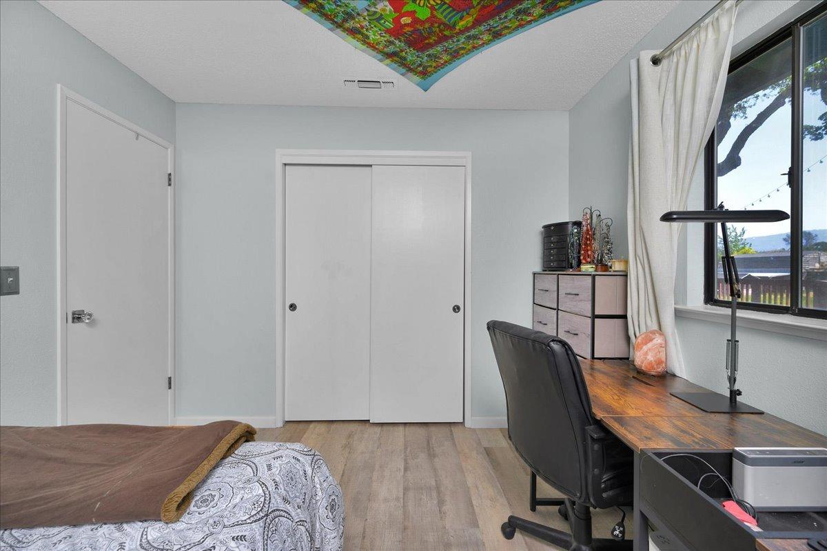 26982 Twin Ponds Road Clovis, CA 93619 - Photo 28 of 48 a bedroom with furniture and a window