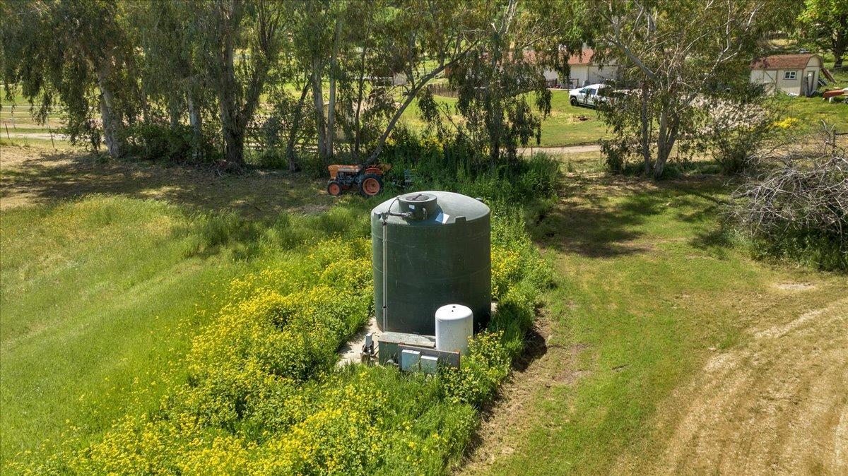 26982 Twin Ponds Road Clovis, CA 93619 - Photo 38 of 48 a aerial view of a house with a yard and large trees