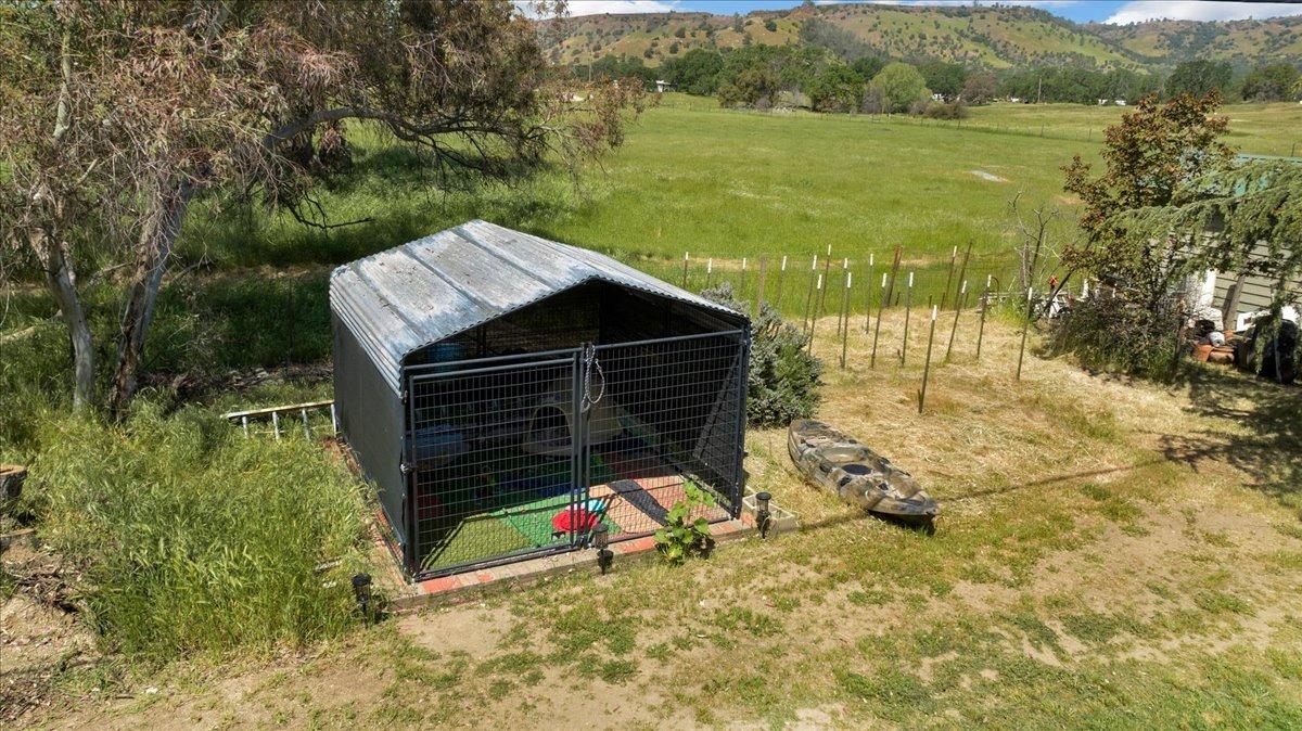 26982 Twin Ponds Road Clovis, CA 93619 - Photo 40 of 48 a view of a wooden deck and a lake view
