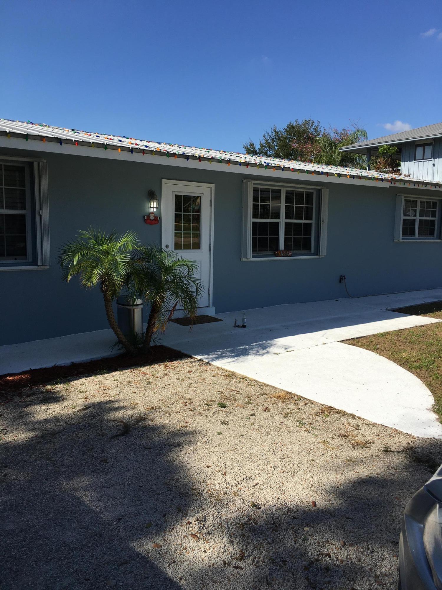 4594 Southeast Robertson Road Stuart, FL 34997 - Photo 3 of 38 IMG_0687