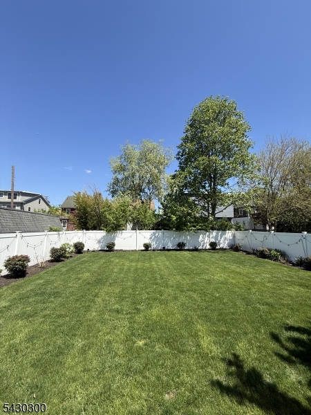 25 Spring Street, Unit A Millburn, NJ 07041 - Photo 20 of 21 a view of a field of grass and trees