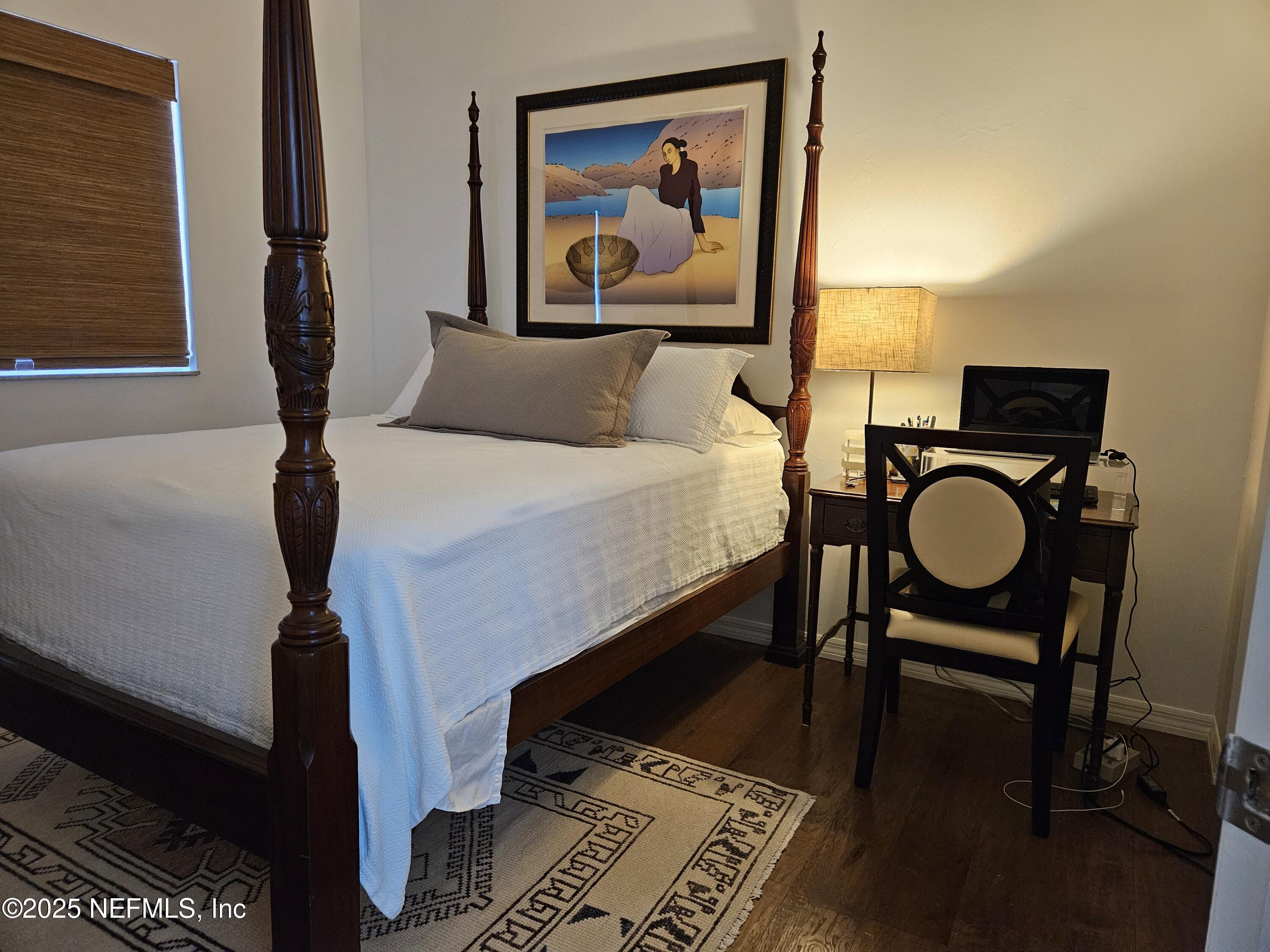 340 Shamrock Road St. Augustine, FL 32086 - Photo 17 of 21 a view of a livingroom with furniture and wooden floor